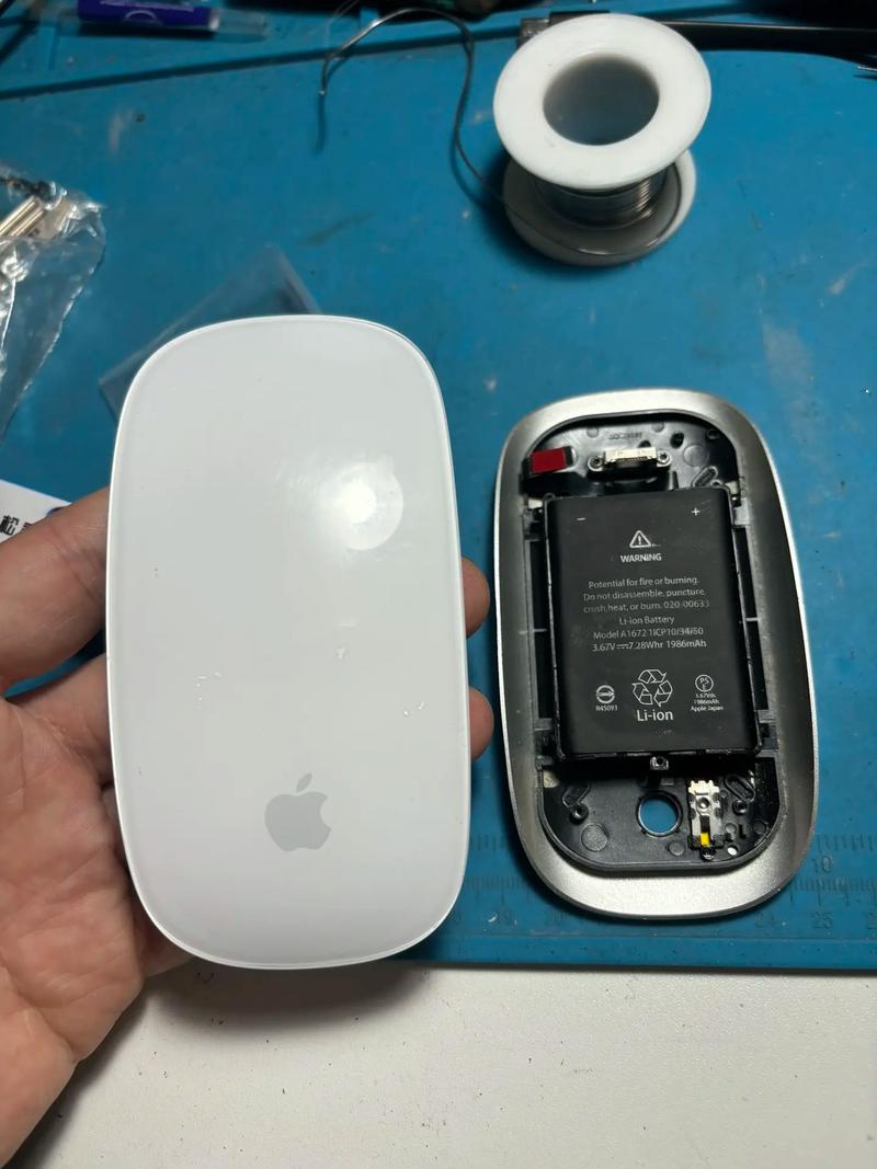 苹果鼠标后盖怎么打开